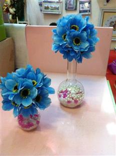 Cặp hoa nhí xanh